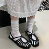 Baotou Roman sandals women's summer 2025 summer new French woven flat-bottomed pig cage shoes fairy strap soft sole