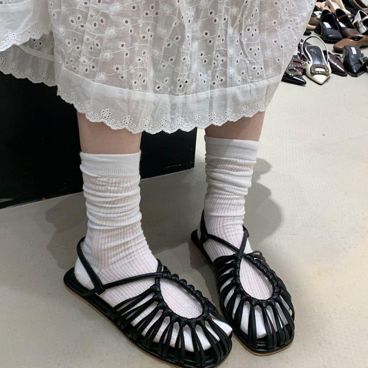 Baotou Roman sandals women's summer 2025 summer new French woven flat-bottomed pig cage shoes fairy strap soft sole