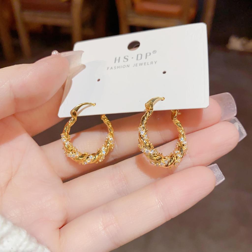 Chic Zircon Twist Ear Cuffs: Elegant, Unique, and Fashionable Earrings for Women.
