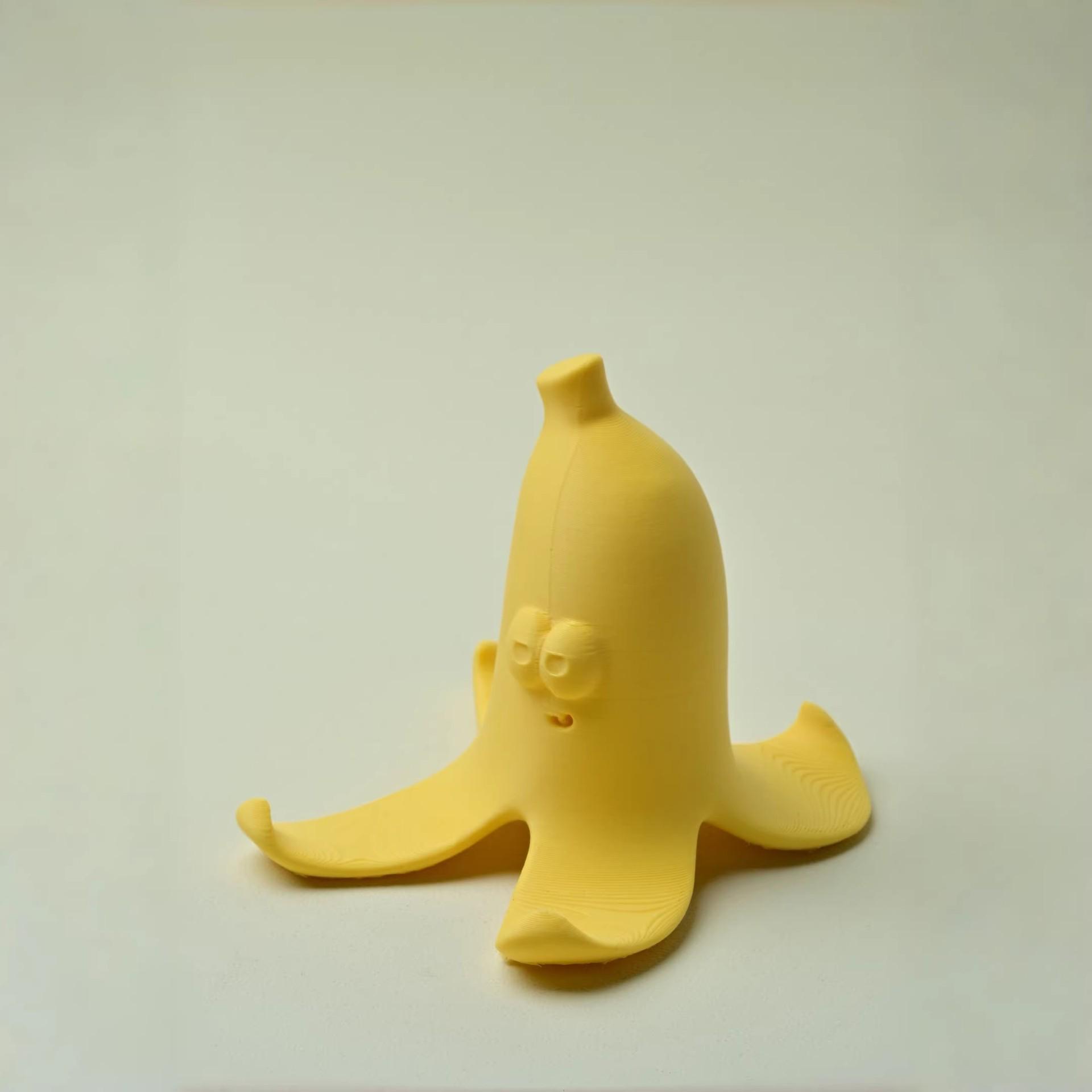 3D Printed Smiley Face Banana Phone Holder - Creative Desktop Prank Ornament