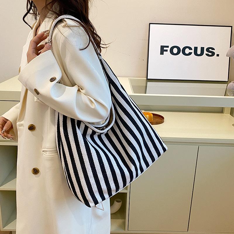Small fresh striped handbag shoulder large capacity casual bag new women's bag messenger bag bucket bag