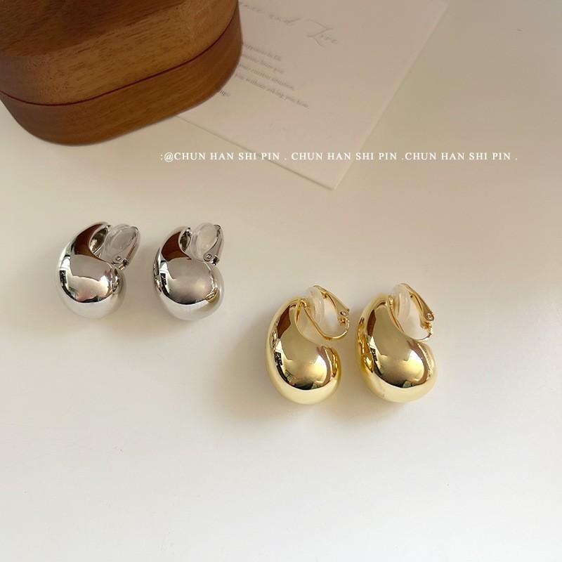 

Metal wind without earholes, gold earrings, advanced sense ins personality exaggerated water droplets, hollow mosquito coil disc ear clips