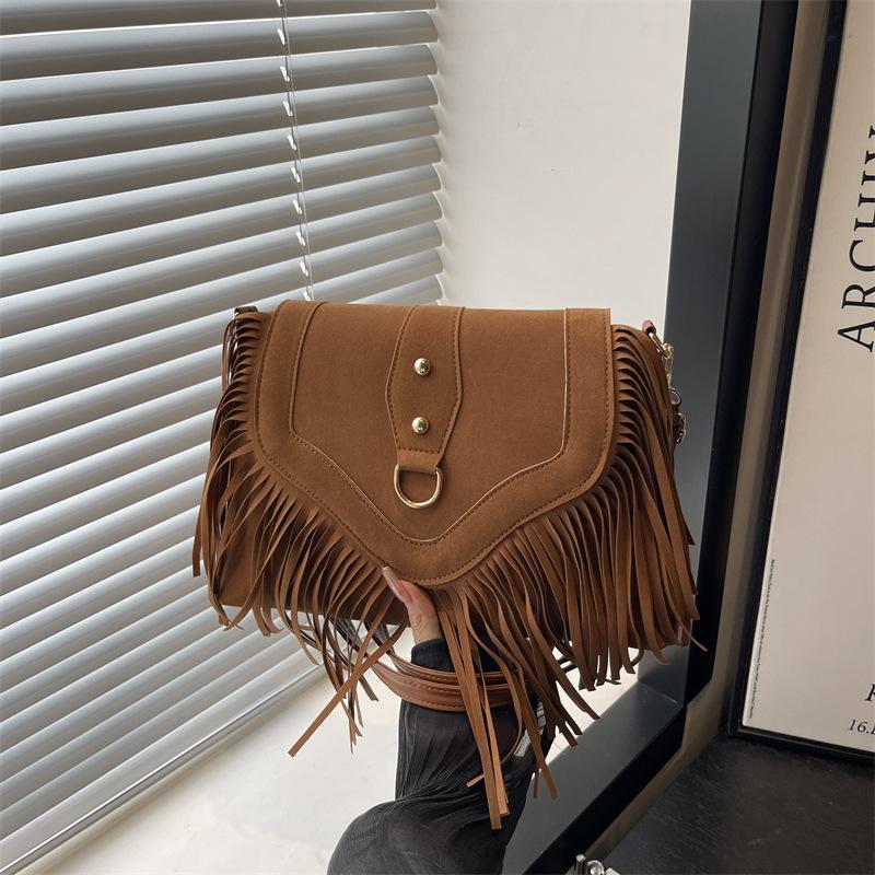 Niche Retro Commuter Locomotive Fringed Bag Women's New Leather Buckle Matte Shoulder Bag Commuter Messenger Bag Tide