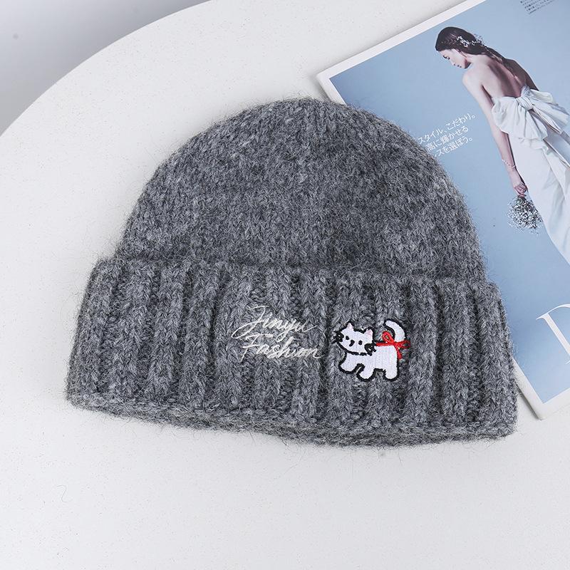 Source new cat letter embroidery knitted wool hat women's autumn and winter flanged warm cold hat stack hat