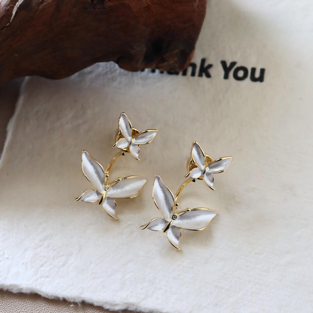 

Trendy Design Sense, High-End Small Butterfly Oil Drip Earrings, A Female Two-Wear Temperament Earrings Worker