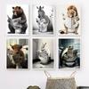 Lion Rabbit Bear Sitting On The Toilet Reading A Newspaper Posters And Print Wall Art Canvas Painting Funny Bathroom Humor Decor