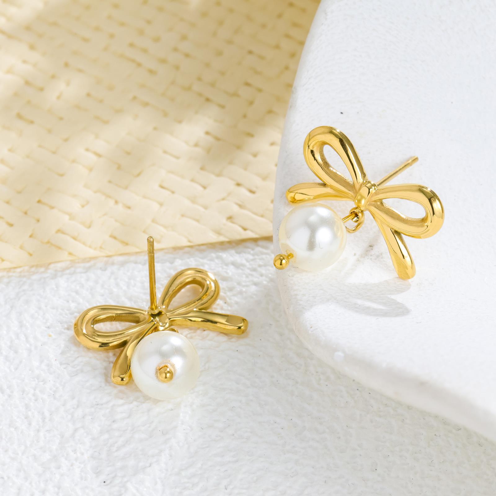 

Personalized geometric design bow hanging pearl earrings fashion temperament elegant titanium steel earrings women