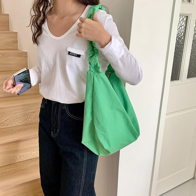 Shoulder bag women's senior sense spring and summer versatile commuter dumpling bag nylon drawstring pleated casual messenger bag women
