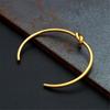 Elegant Geometric Open Knot Bangle Bracelet In Gold Finish Jewelry Accessory for Fashionable Women Seek Unique Styles