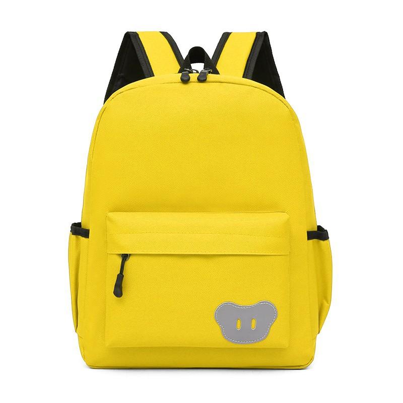 Solid color nylon primary school schoolbag school education polyester breathable burden reduction primary school