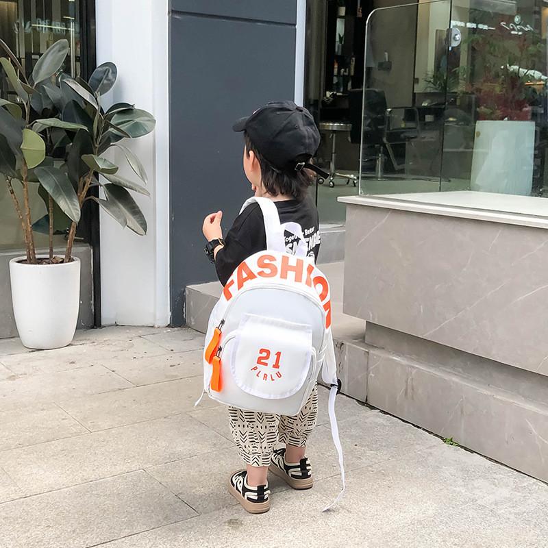Sac à dos élégant et durable en nylon pour enfants avec un design moderne et respirant, disponible en plusieurs couleurs