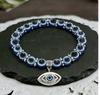 Böser Blick Armband mit Perlen, runden Glasperlen und Metall-Amulett, dehnbar, verstellbar, Schmuck für den Alltag und als Geschenk