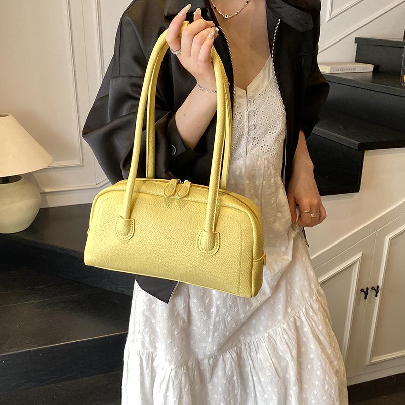 Fashion baguette bag 2025 new simple texture hand-held underarm bag high-end niche commuter shoulder bag women's bag