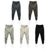 Pantalones informales para hombre, cintura elástica, botones, bragueta, pantalones largos, bolsillos, cierre de Color sólido, puños de cinta, pantalones de estilo deportivo de tenis
