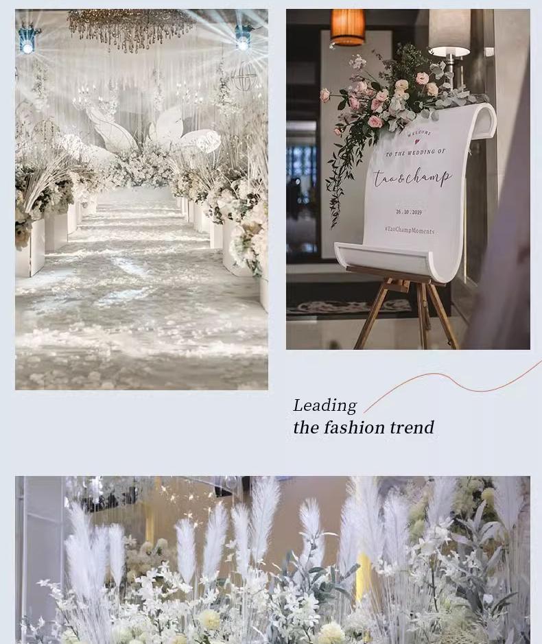 Hochzeitsgangdekoration im New Forest-Stil mit Blumen und Federn