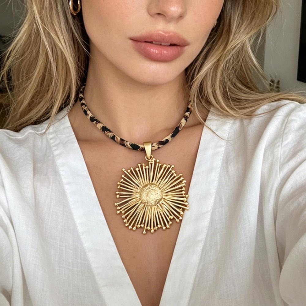 Matte Gold Sunflower Pendant Necklace with Leopard Print Design