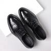 The first layer of cowhide new men's leather shoes Brock carved leather casual men's soft-soled pointed men's shoes