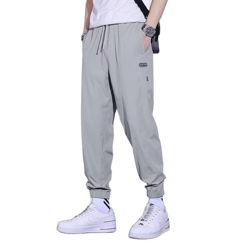 Men's casual pants elastic, loose, simple and comfortable, young students slim-fitting small feet and trousers
