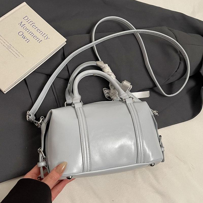 Fashion niche hand carry bowling bag women 2025 new Korean version trend high-end shoulder bag versatile messenger bag