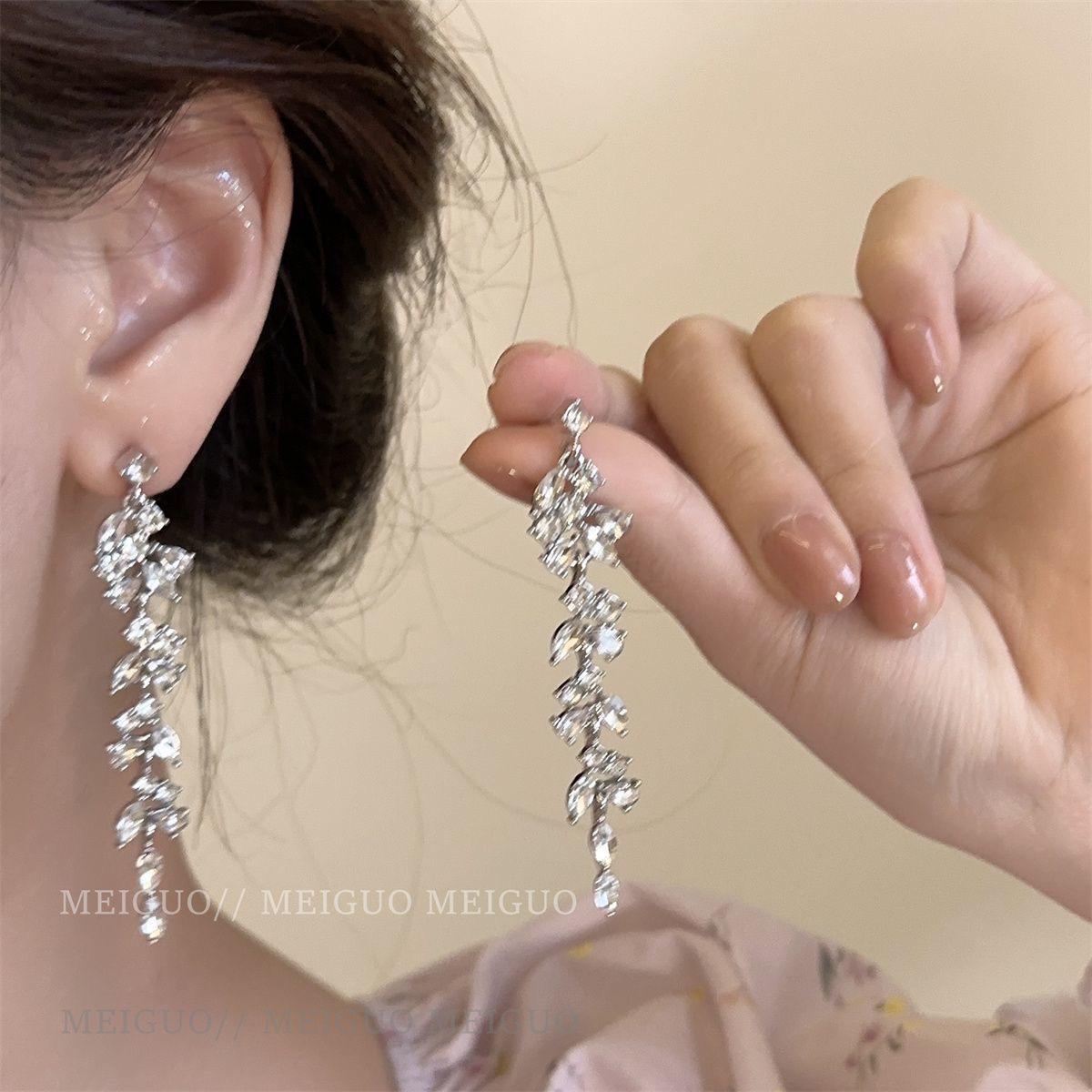 

Звездные серьги-клипсы с кисточками - Роскошные и универсальные для женщин