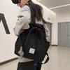 New dual-purpose small backpack, casual niche girlfriend handheld shoulder bag, Japanese and Korean drawstring commuter work backpack