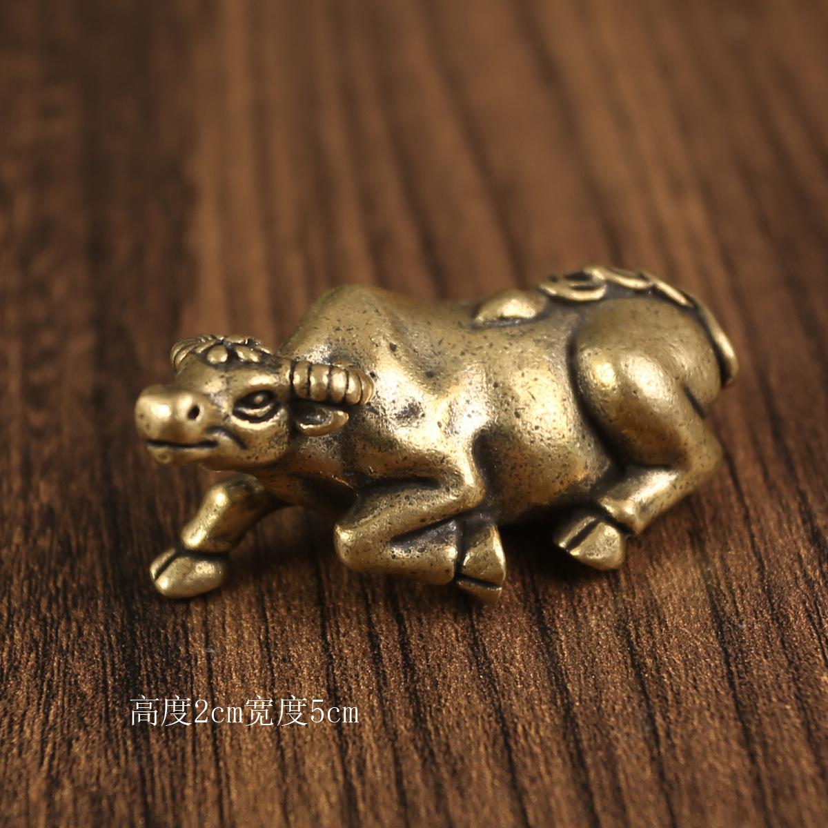 

Brass reclining cow ornament creative tea pet copper ware office tea table small copper ware metal copper products pure copper zodiac cow