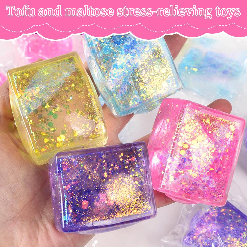 Giocattolo Antistress Cubo di Maltosio da Spremere D ecompressione Piccoli Cubetti di Ghiaccio Antistress Rimbalzo Lento Luce Polare Colorato Spremere Blocco in TPR