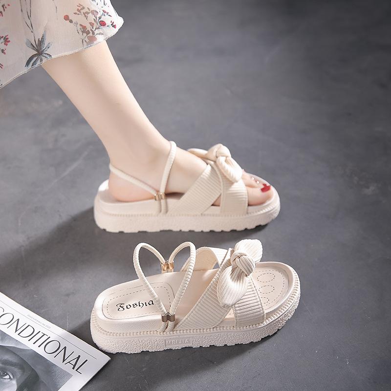 

Two sandals for women s summer wear New Year s with skirts, thick-soled beach slippers 40