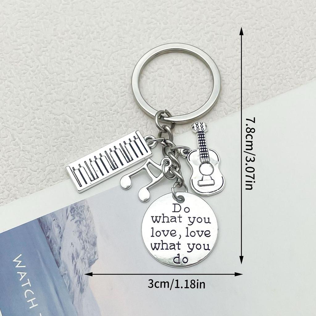 Antique Silver Music Cassette & Saxophone Keychain with Creative Design