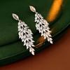 Silver Zirconia Bow Tassel Earrings: Korean Style, Exaggerated Luxury Ear Stud Ornaments.