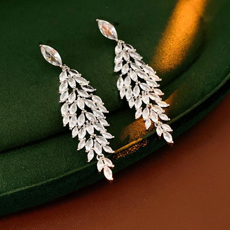 Silver Zirconia Bow Tassel Earrings: Korean Style, Exaggerated Luxury Ear Stud Ornaments.