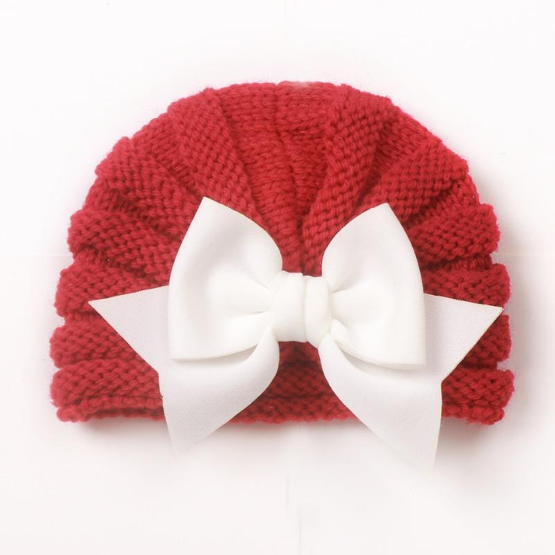 Christmas new baby autumn and winter warm knitted hat, children's bow pullover hat, baby hat