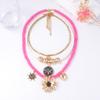 European and American light luxury high-end design sense multi-layer stacking beaded alloy flower animal pendant female versatile necklace