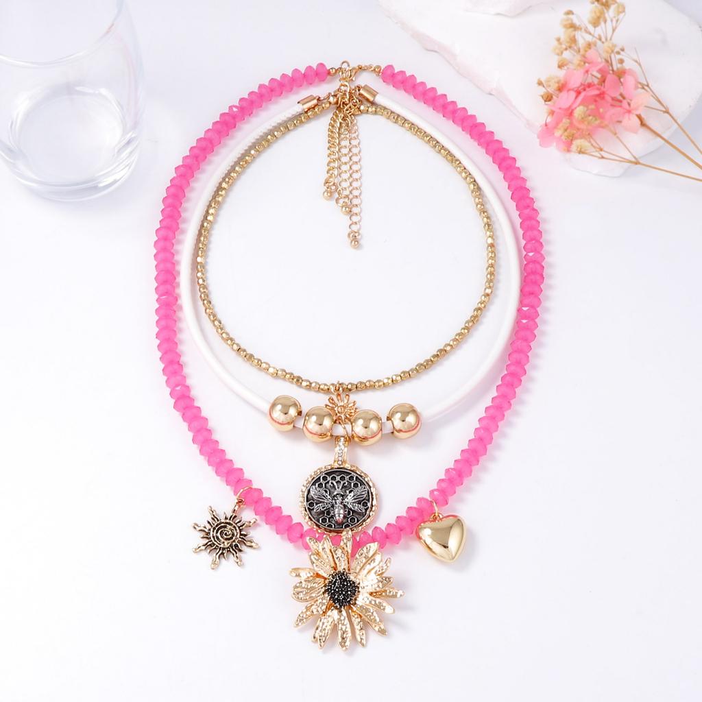 European and American light luxury high-end design sense multi-layer stacking beaded alloy flower animal pendant female versatile necklace