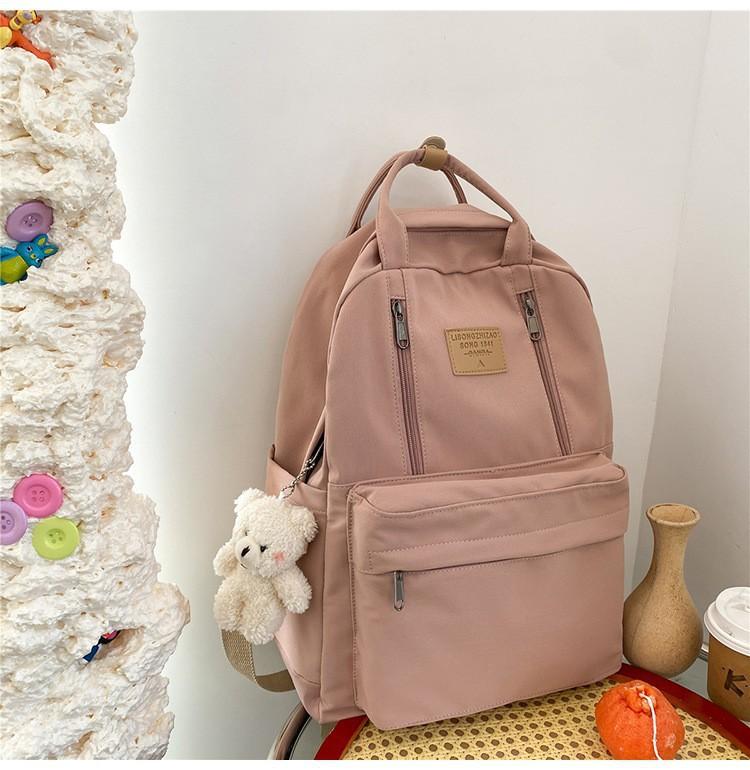 Schoolbag1011 new Japanese middle and high school student schoolbag women's large-capacity backpack simple outdoor commuter computer backpack