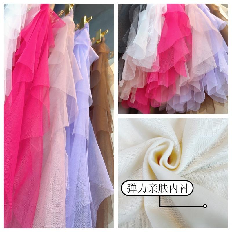 Manufacturer, Elastic Waist Fashionable Versatile and Thin Mesh Stitching Irregular Medium and Long Skirt