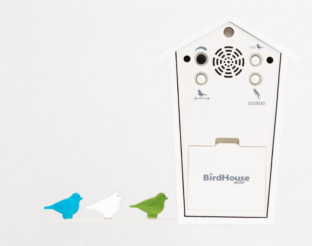 KOOKOO Birdhouse Mini White Wall Clock - A modern dove-shaped wall clock, perfect as a gift for grandchildren, anniversaries, or as an interior design
