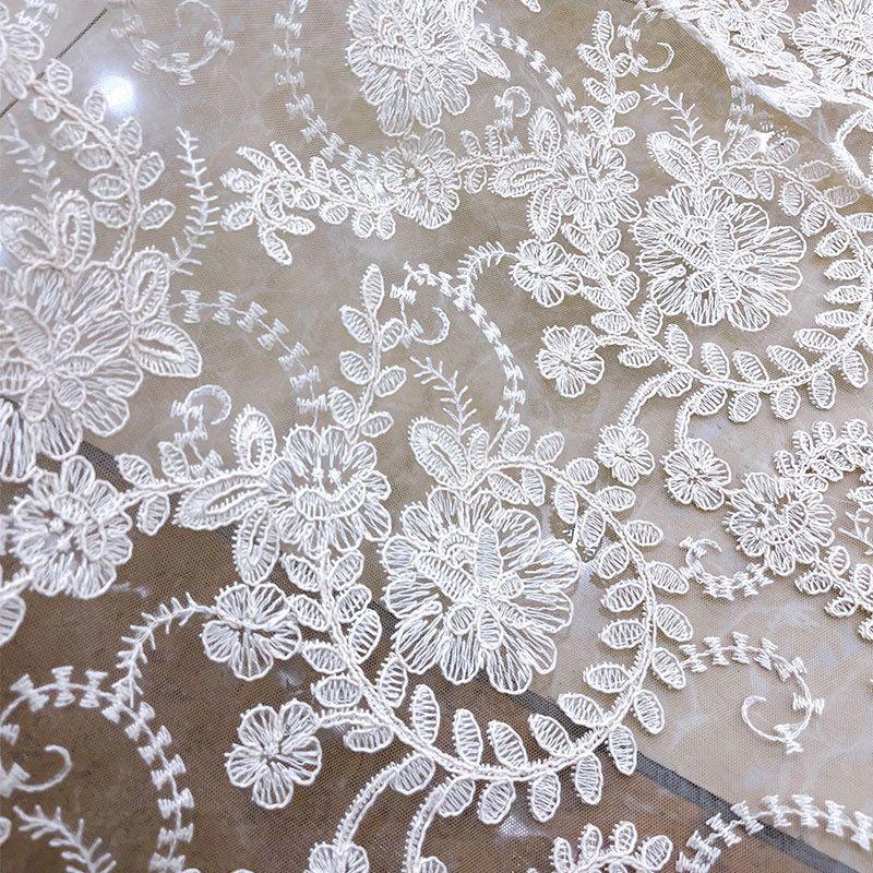Embroidered Lace Fabric with Flower-like Patterns Suitable for Wedding Dresses Formal Gowns and Designer Clothing Fabrics