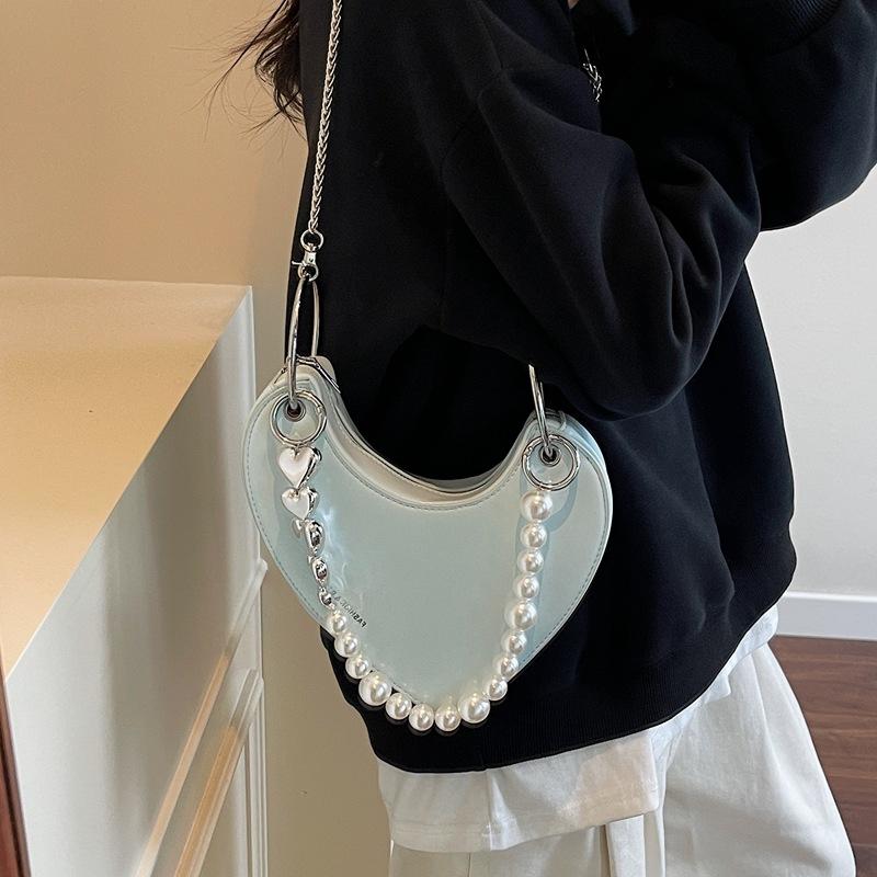 Niche design bag women's new summer chain messenger bag peach heart bag
