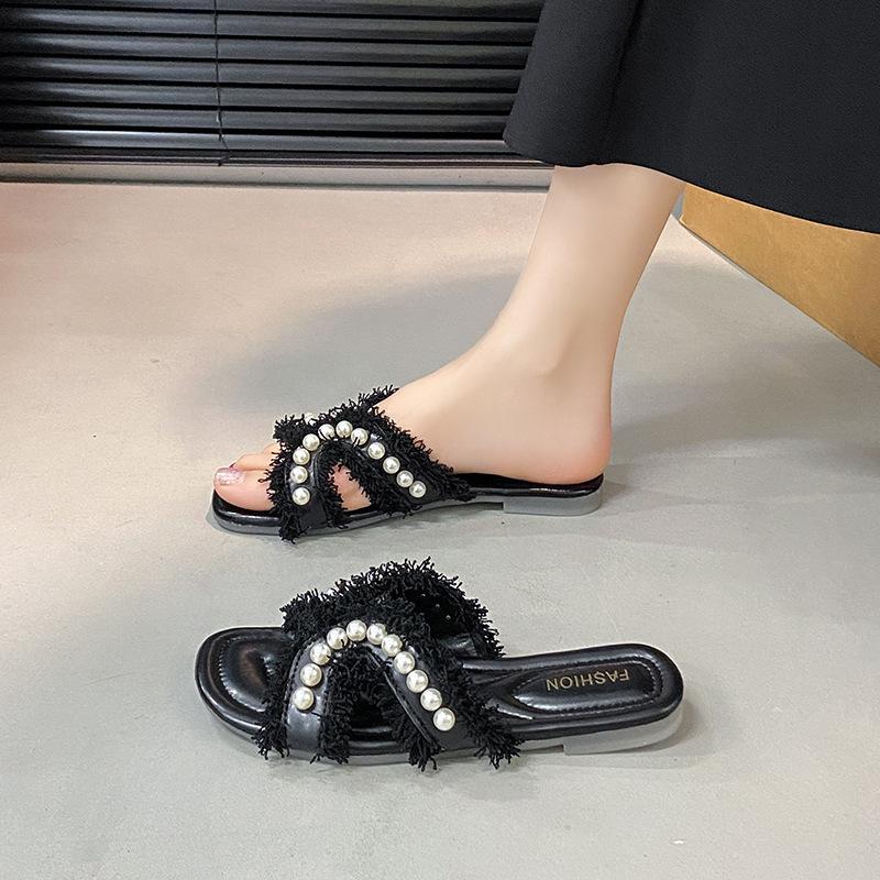 

Design sense wear 2025 women s new summer small fragrant wind cool pearl niche slippers seaside beach one-word drag 40