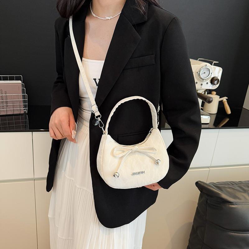 Niche design bow handbag new high-end single shoulder underarm bag female crossbody dumpling bag