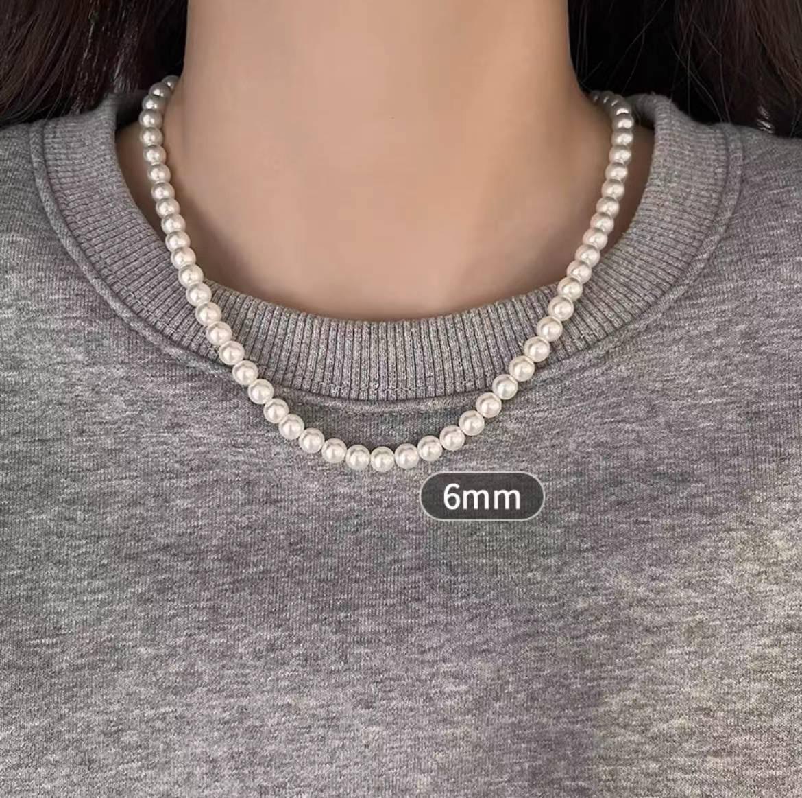 Элегантное жемчужное ожерелье-бантик: Роскошная цепочка на ключицу из сплава с нишевым дизайном