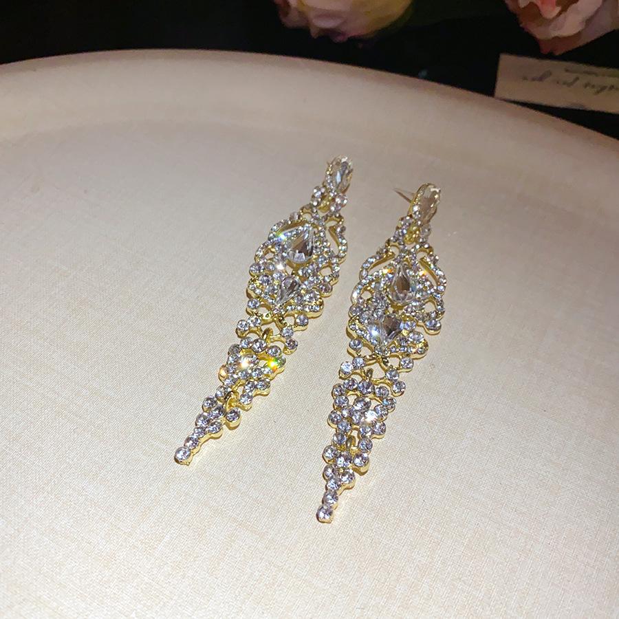 Silver needle with diamonds hollow water drop fringed earrings retro court style elegant earrings light luxury high-end earrings