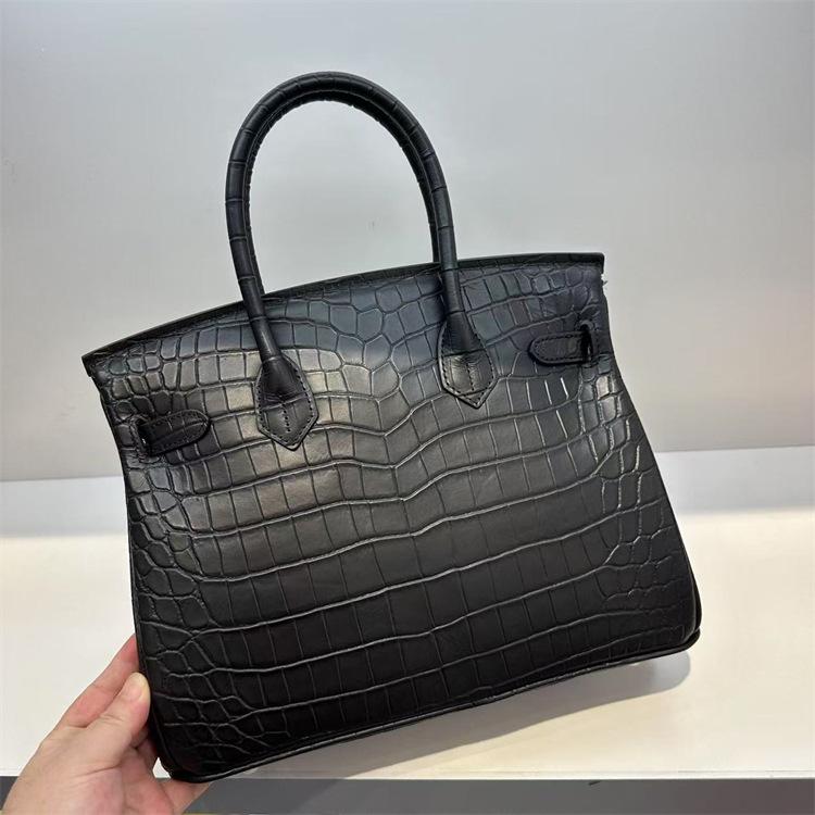 Pelle bovina primo strato motivo alligatore opaca portatile a spalla a tracolla borsa da donna premium transfrontaliera