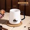 Tasse en céramique avec couvercle et cuillère