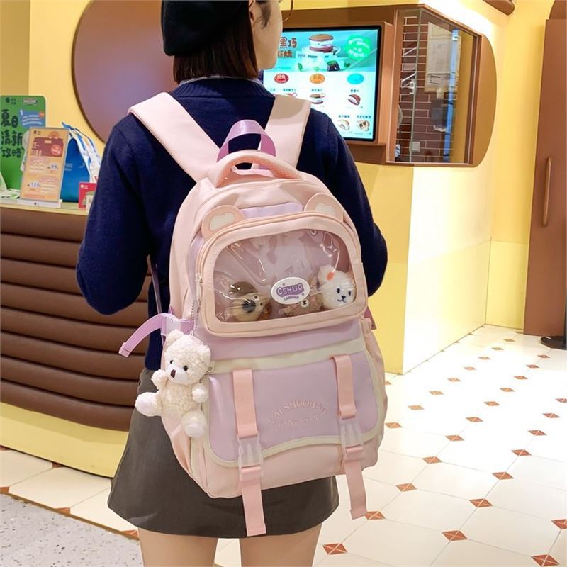 Schoolbag1011 autumn new high-value color matching design transparent pain bag cute cartoon student large-capacity backpack