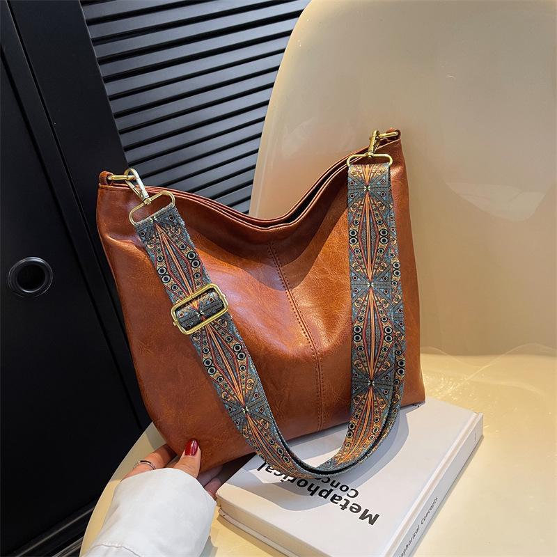 «Шикарная женская сумка-ведро большой вместимости в европейско-американском стиле»: Нишевый дизайн, идеальный для поездок на работу