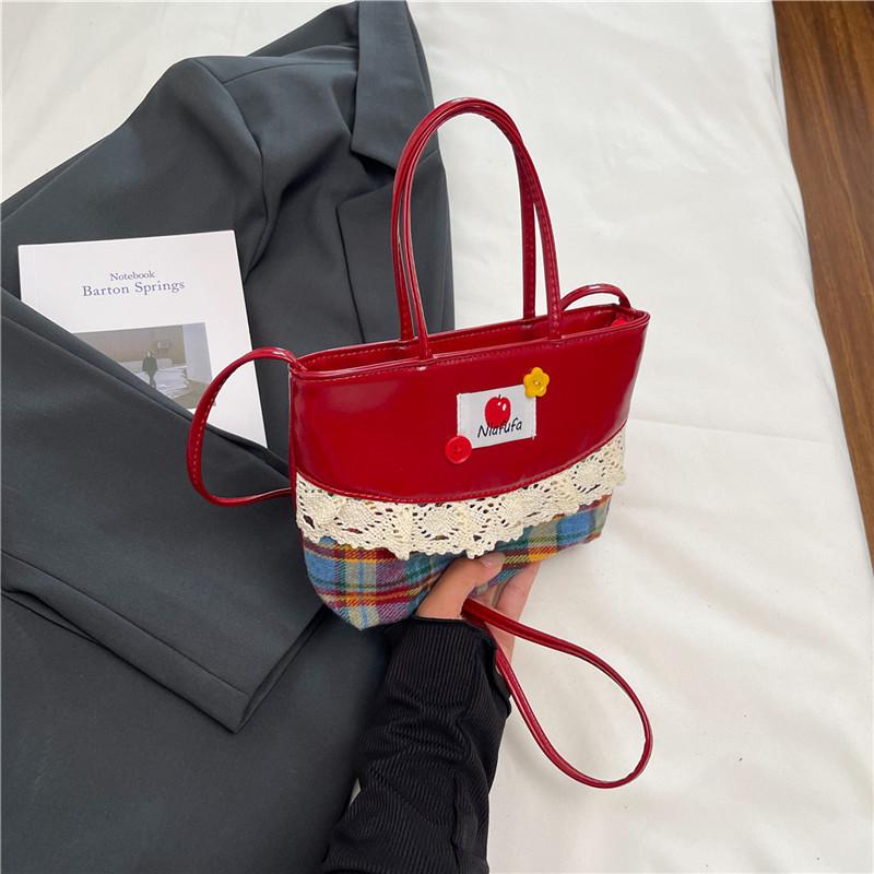 Autumn and winter high-end light luxury niche fringed bag women's new retro brown fashion portable messenger bag