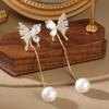 Elegant Two-Way Butterfly Pearl Tassel Earrings: Versatile, Slimming Studs for a Sweet, High-End Look.