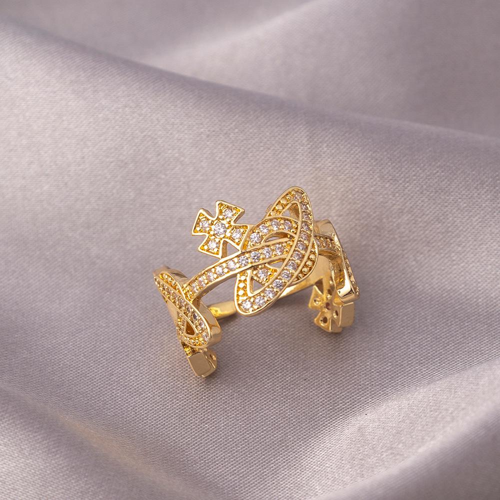 

Высококлассное кольцо в стиле ретро Сатурн с крупным цирконом